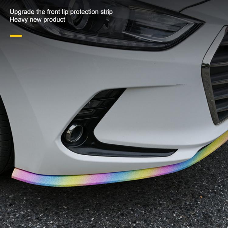 Car front headlight corner with rainbow iridescent anti-collision lip strip edging.