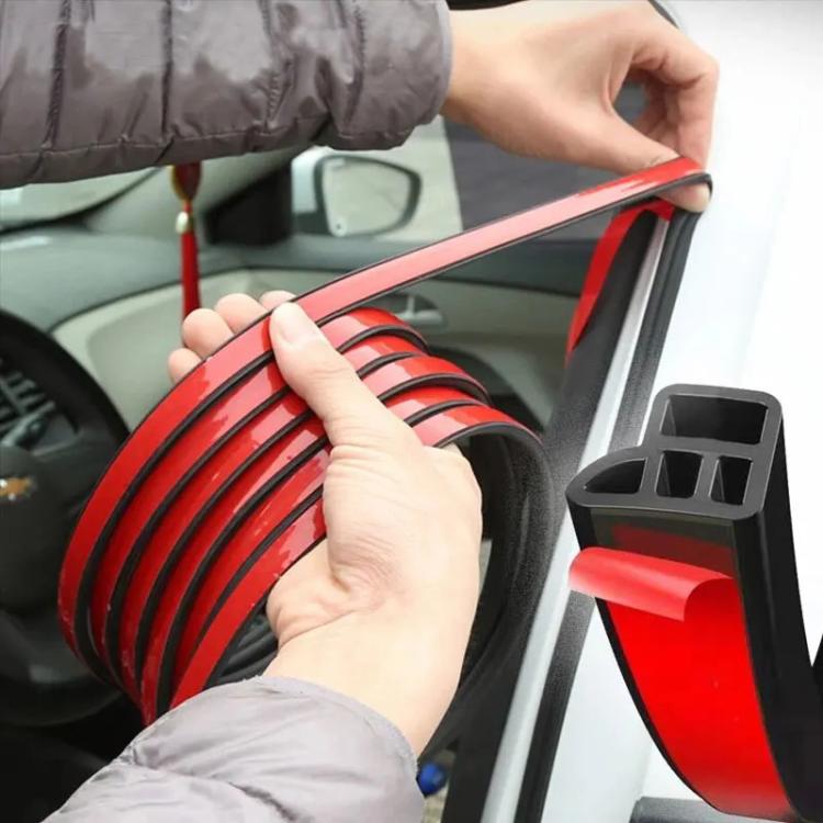 Black L-type rubber seal strip being installed along a car door opening edge