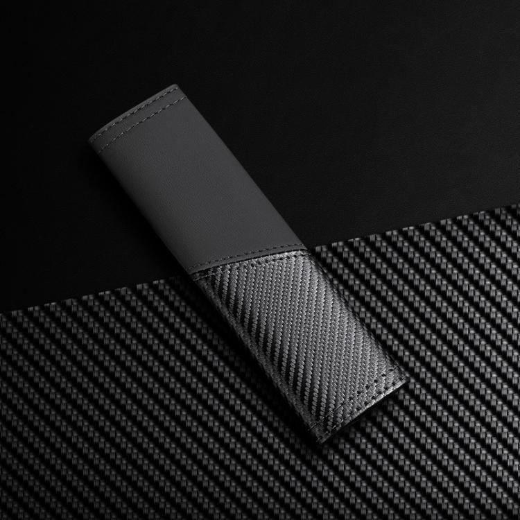 Black leather seat belt shoulder guard with carbon-fiber texture panel