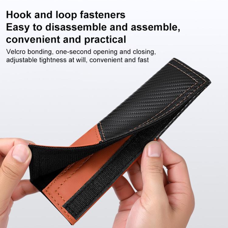 Car seat belt shoulder guard with orange leather trim, carbon-fiber panel, hook-loop closure