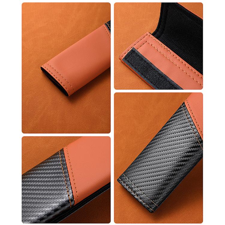 Car seat belt shoulder guard, orange leather cover with black carbon-fiber weave detail