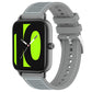 Gray hybrid nylon and silicone watch band with adjustable holes and metal buckle, shown on a watch.