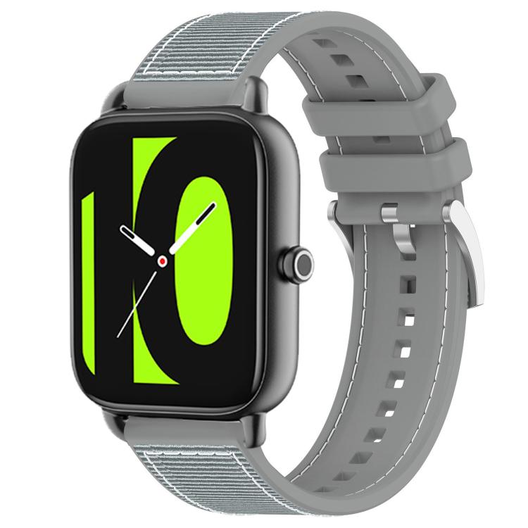 Gray hybrid nylon and silicone watch band with adjustable holes and metal buckle, shown on a watch.