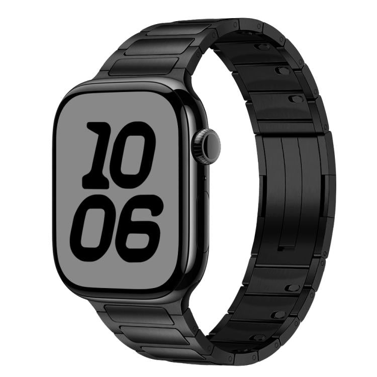 Black stainless steel Apple Watch band with linked tri-bead design, shown attached to a watch.