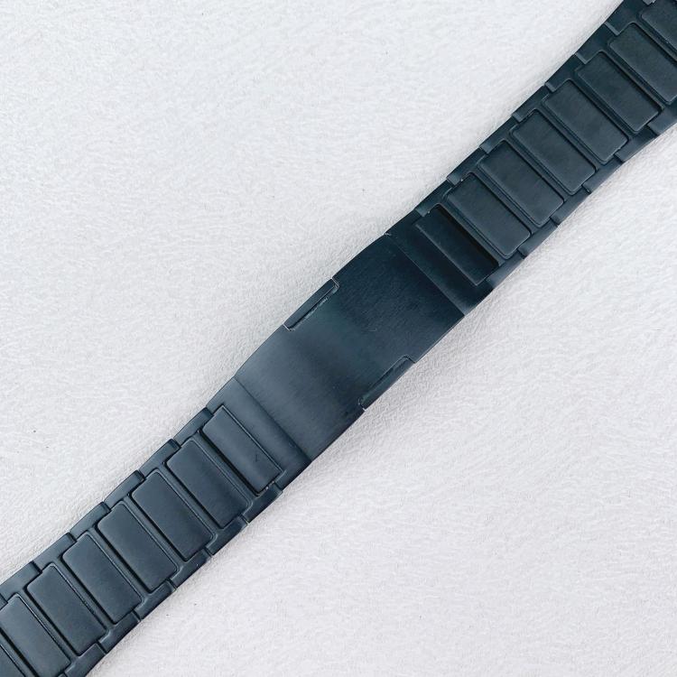 Black stainless steel watch band showing its smooth clasp and rectangular links.