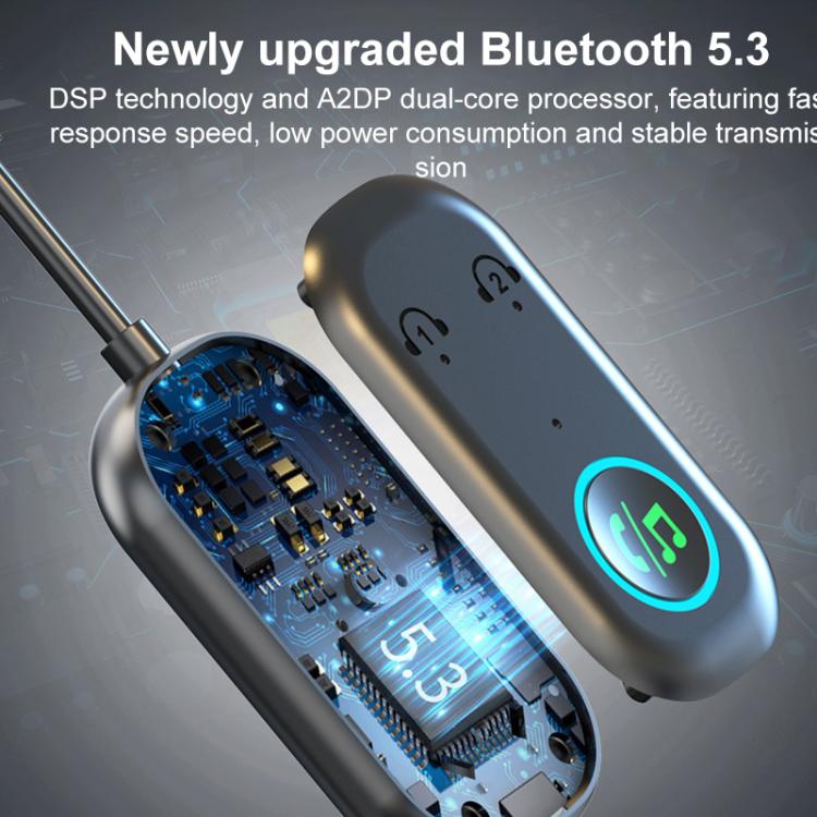 Bluetooth AUX audio adapter showing circuit board inside capsule, black with blue LED ring