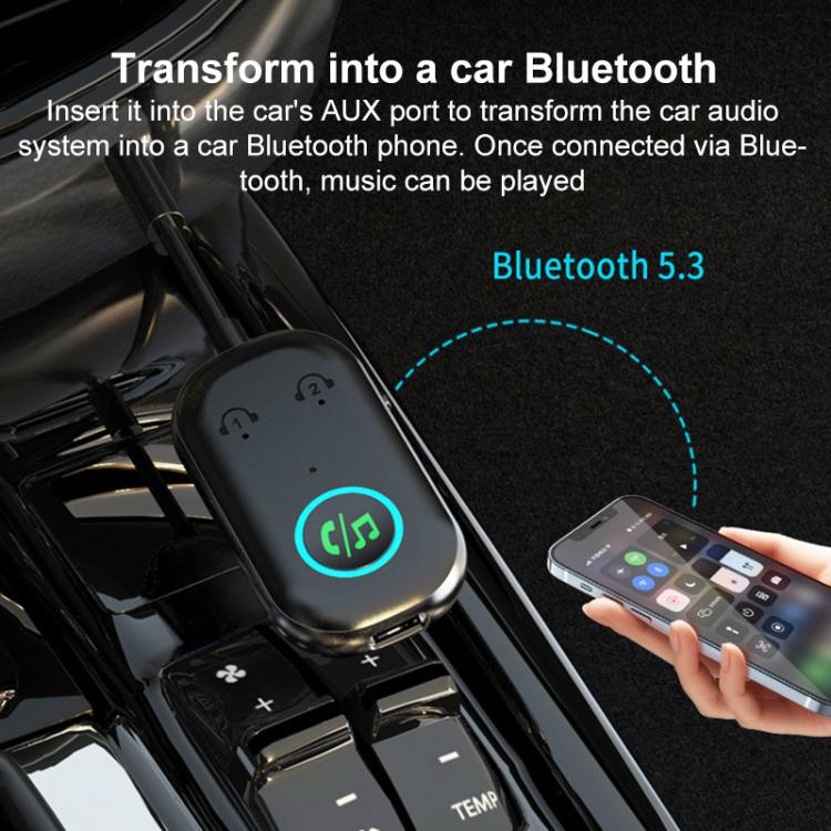 Bluetooth AUX audio adapter plugged into vehicle AUX port, blue-lit function button