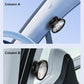 Black auxiliary rearview mirror mounted near window on a car interior