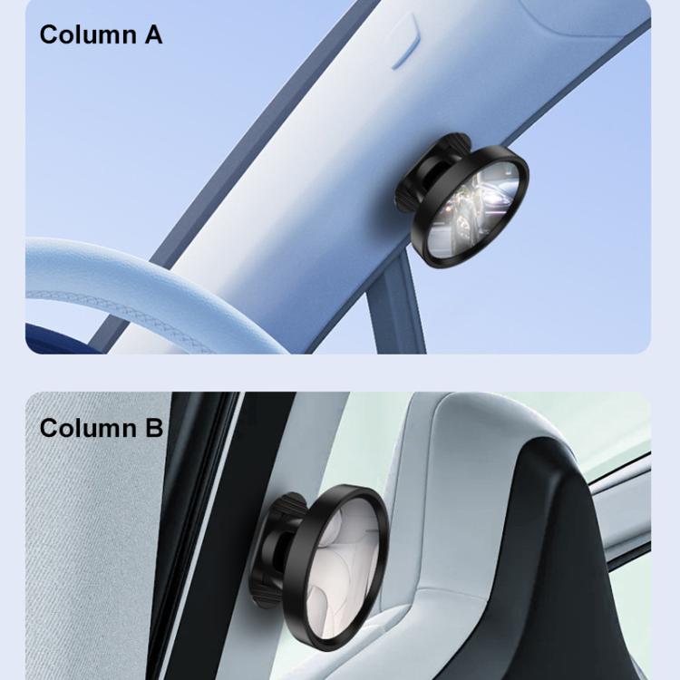 Black auxiliary rearview mirror mounted near window on a car interior