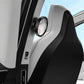 Black-and-silver auxiliary mirror mounted on car seat side panel