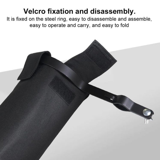 Black drumstick bag with Velcro strap securing the barrel and clip handle