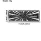 Black rectangular decorative sticker with white radial streak burst and outlined border