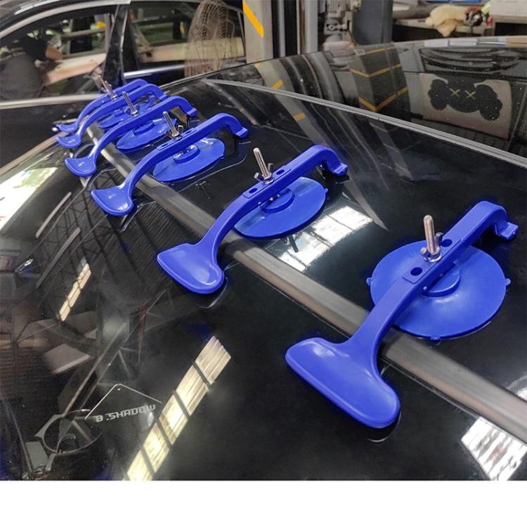Blue suction cup clamp tools mounted on car windshield glass, 6-pack set