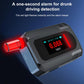 Handheld alcohol tester with red alarm light and %BAC readout on screen