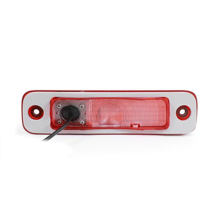 Red high-mount brake light camera with exposed mounting bracket and lens