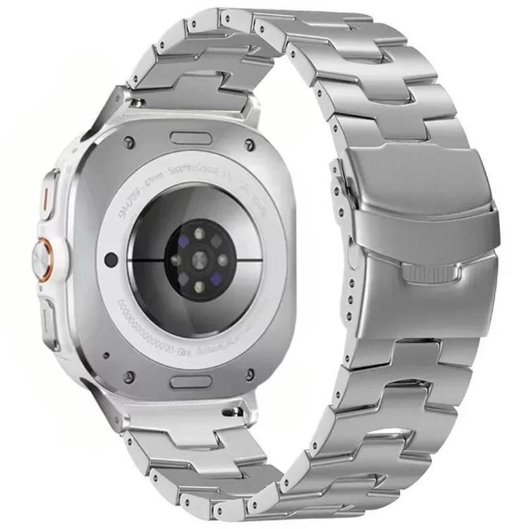 Silver titanium alloy watch band with wide links and safety buckle, rear view