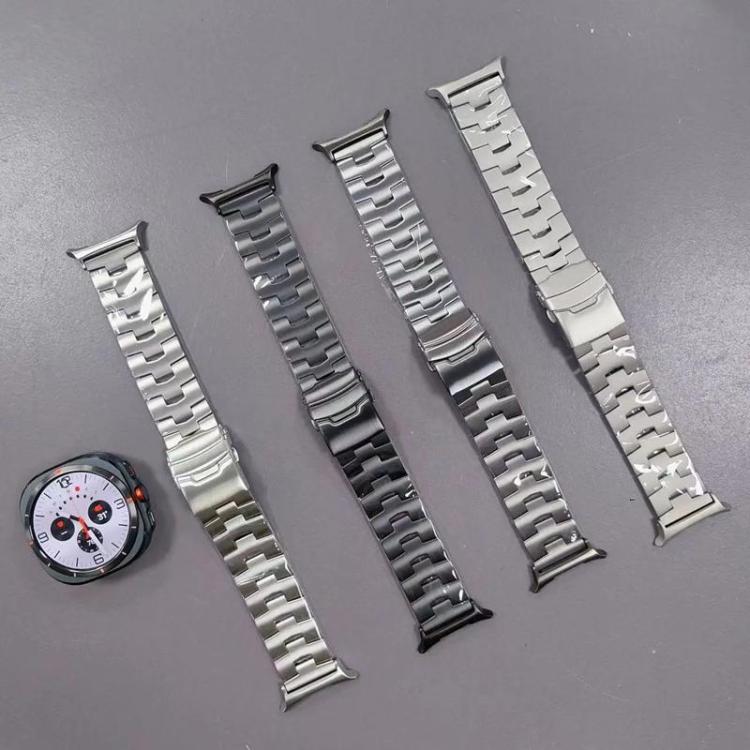 Four titanium alloy watch bands in silver, gray, and black with linked designs