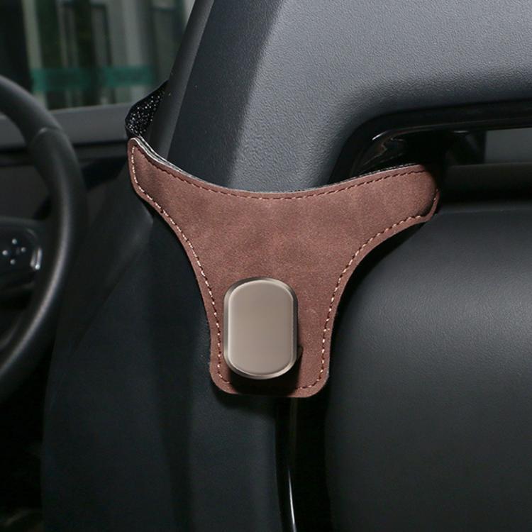 Car seat back hanger hook in brown suede with a rounded metal clip holder