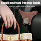 Brown car seat back hanger hook with metal clip holding a bag handle