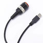 Black cable with USB-A plug and metal-banded circular connector with pins
