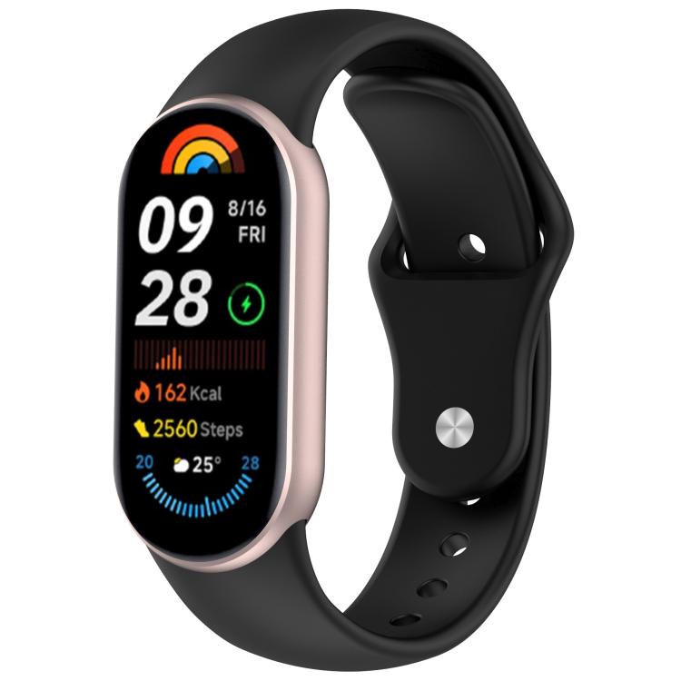 Black silicone watch band with reverse buckle fitted to a fitness tracker