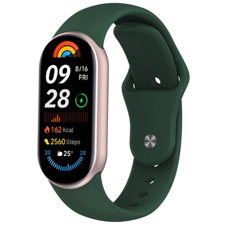 Dark green silicone watch band with reverse buckle fitted to a fitness tracker