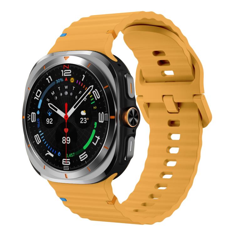 Yellow silicone watch band with ridged texture, shown on a Galaxy Watch Ultra2