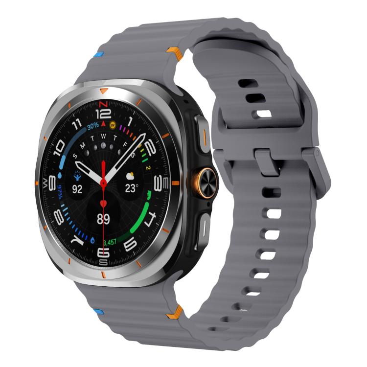 Gray silicone watch band with ridged detailing, shown fitted to a smartwatch.