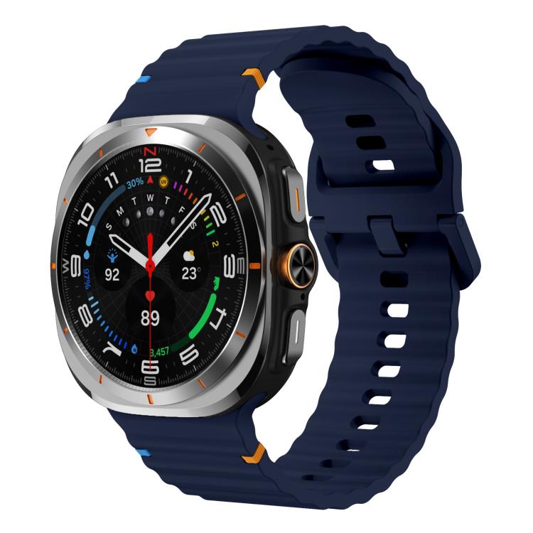 Midnight blue silicone watch band with ridged detailing, shown fitted to a smartwatch.