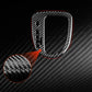 Black carbon fiber gear position panel sticker detail with oval cutout