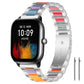 Silver metal watch band with multicolor resin links on a rectangular watch