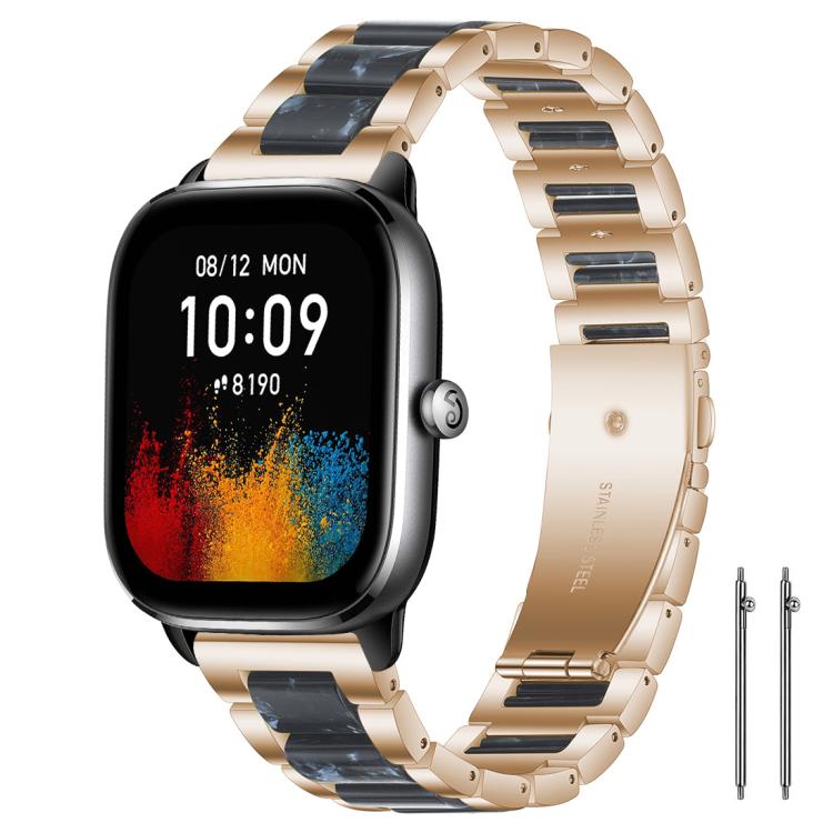 Rose gold metal watch band with dark blue resin inlays and linked beads