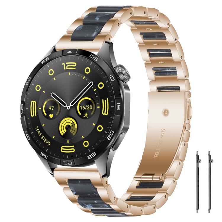 Smartwatch with a rose gold metal band and dark blue resin links