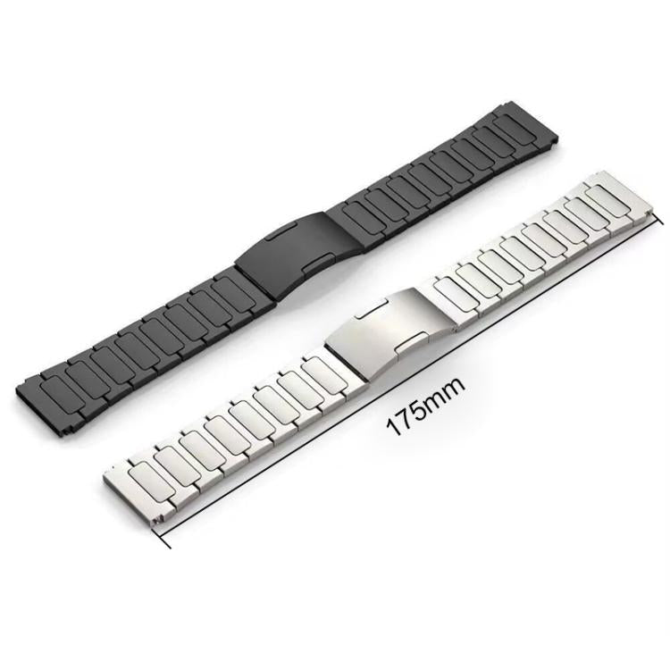 Black and silver stainless steel watch bands laid flat, showing linked sections and folding clasps