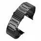 Black stainless steel Apple Watch band with broad stepped links and a folding clasp