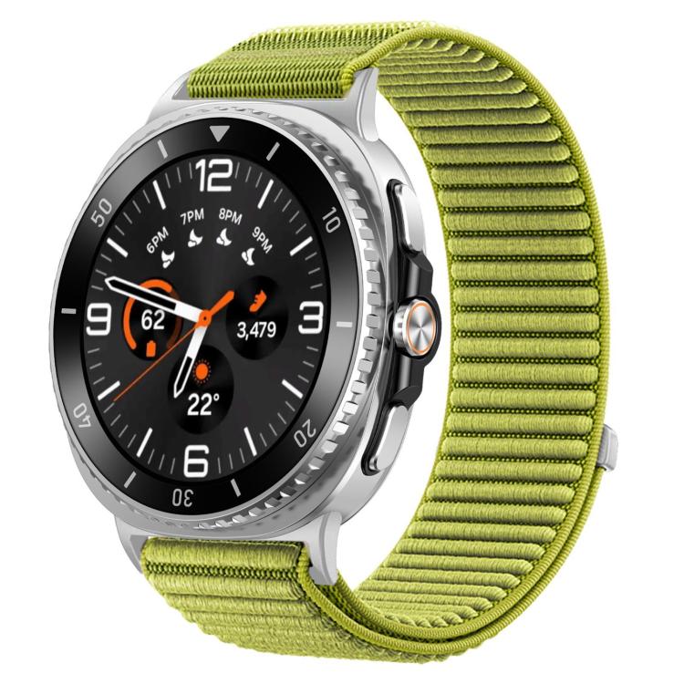 Lime green woven nylon watch band with hook-and-loop closure on a round smartwatch