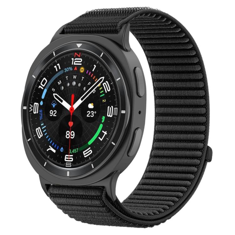 Black woven nylon hook-and-loop watch band fitted to a dark smartwatch