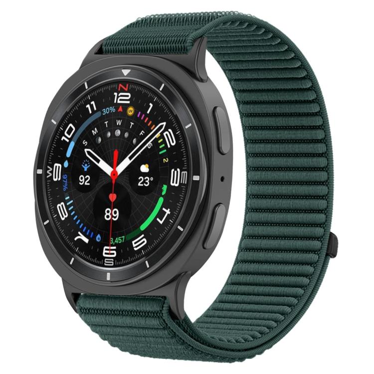 Deep green woven nylon hook-and-loop watch band fitted to a dark smartwatch