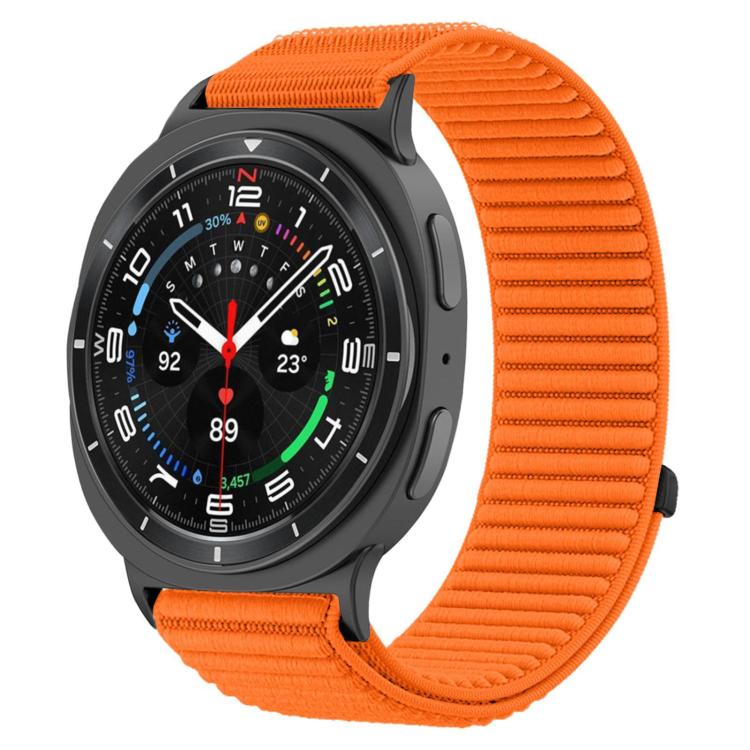 Orange woven nylon hook-and-loop watch band fitted to a dark smartwatch