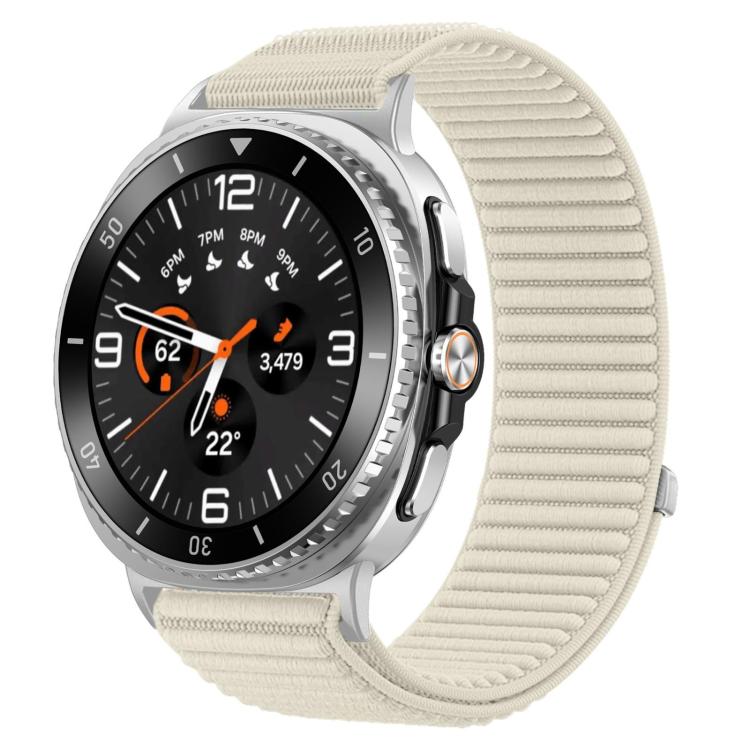 Cream woven nylon hook-and-loop watch band fitted to a silver smartwatch