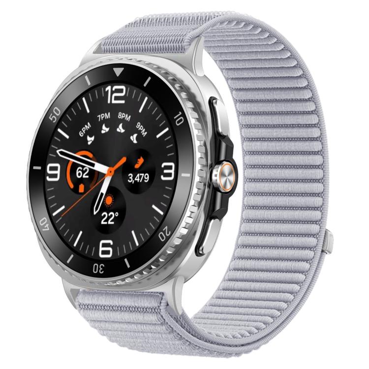 Light gray woven nylon watch band with hook-and-loop closure on a round smartwatch