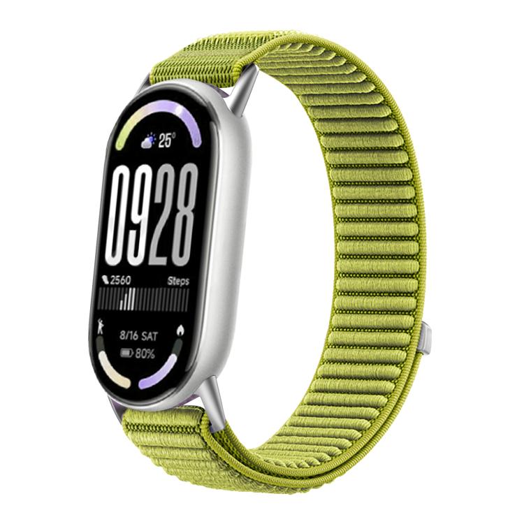 Woven nylon watch band in lime green with hook-and-loop closure, shown on a fitness tracker.