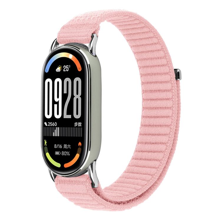 Pearl pink ribbed woven nylon watch band fitted to a smartwatch