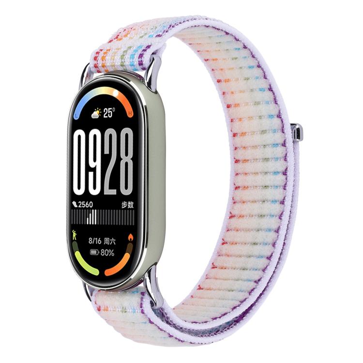 Woven nylon watch band with multicolor flecks and pale purple edging, shown on a fitness tracker.