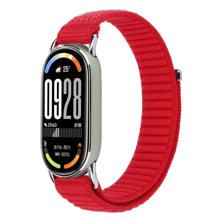 Woven nylon watch band in red with hook-and-loop closure, shown on a fitness tracker.