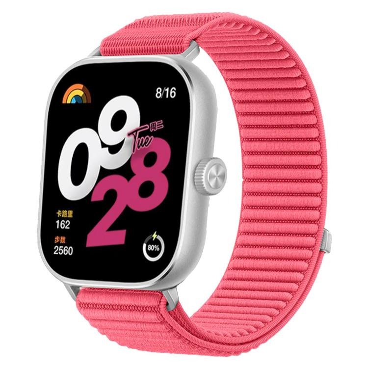Pink woven nylon watch band fitted to a smartwatch