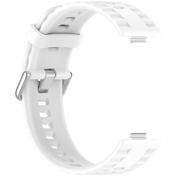 White silicone watch band with silver buckle, shown without a watch