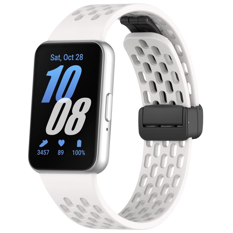 White perforated silicone watch band with black magnetic buckle, shown on Galaxy Fit3