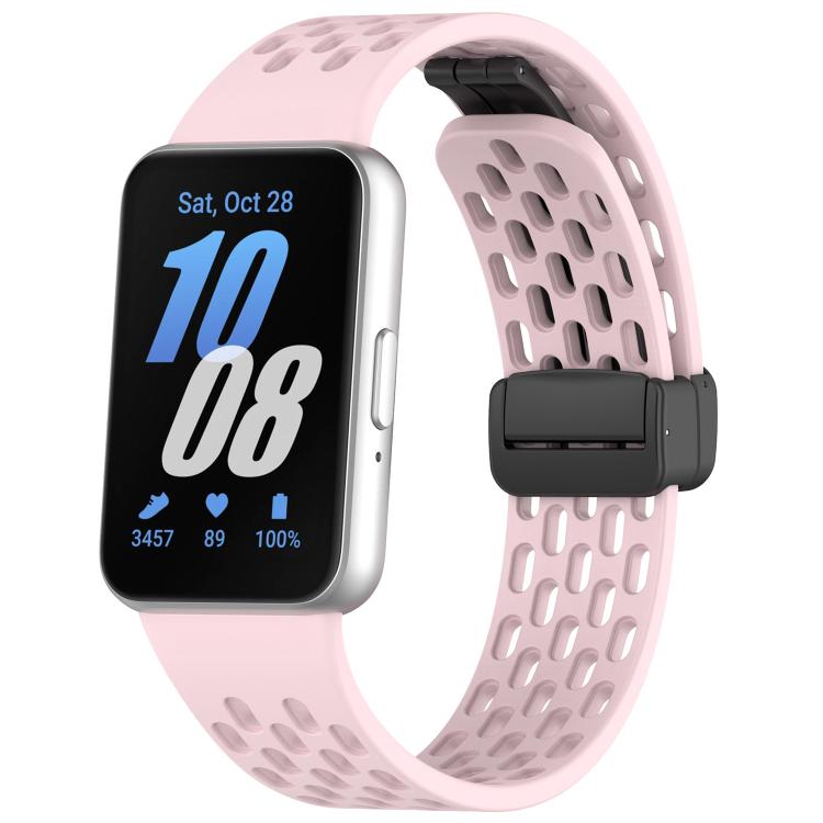 Light pink perforated silicone watch band with black magnetic buckle on Galaxy Fit3
