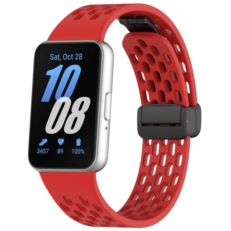 Red perforated silicone watch band with black magnetic buckle on Galaxy Fit3